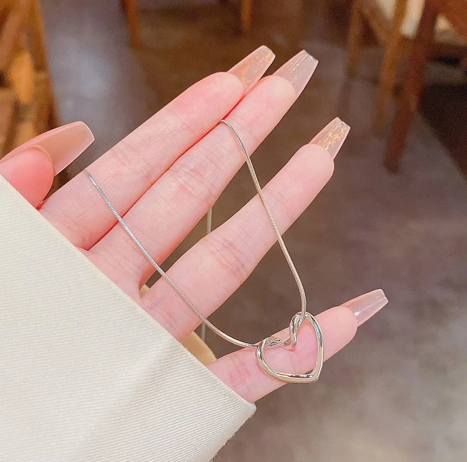 The Aloura Open Heart Necklace