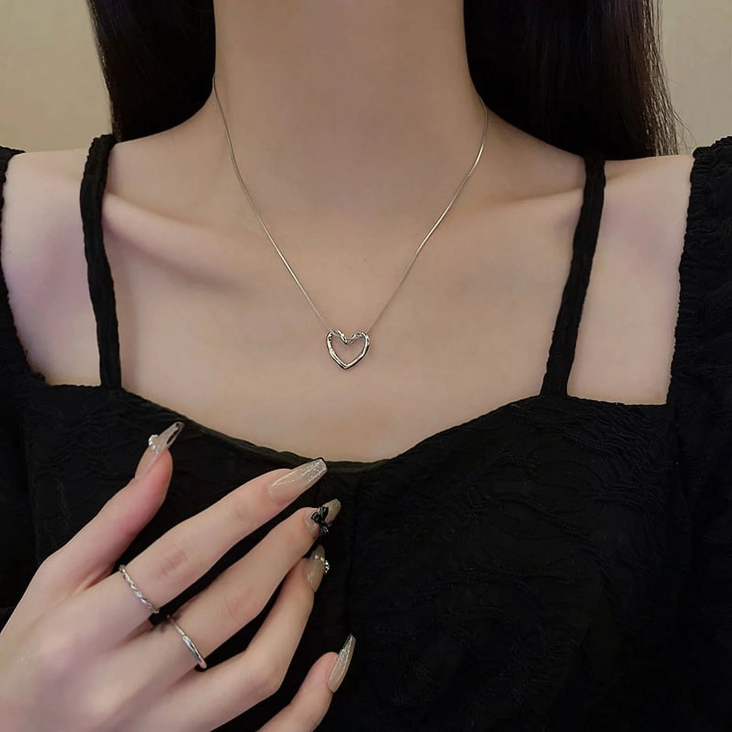 The Aloura Open Heart Necklace